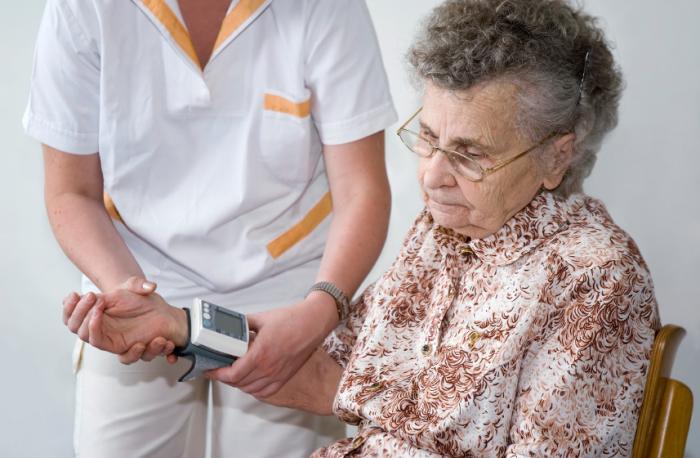 Older lady having her blood pressure checked